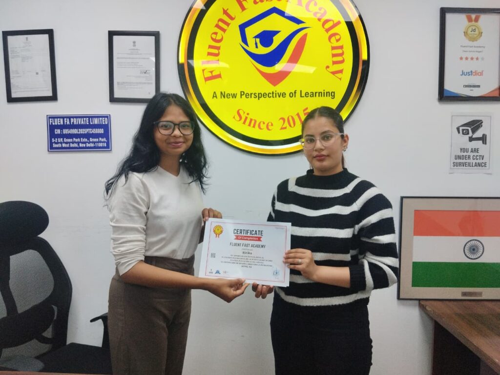 Student receiving German language course certificate from trainers at Fluent Fast Academy
